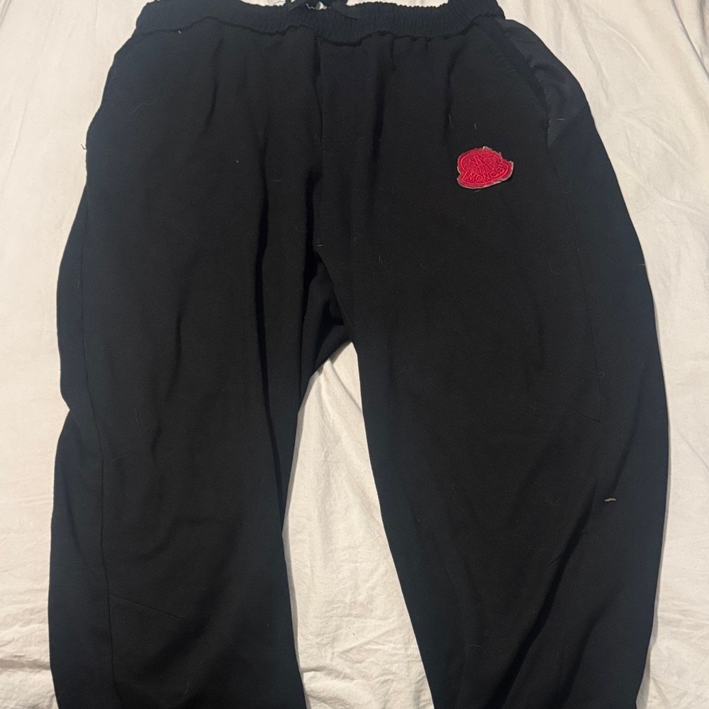 Moncler Black Garment with Red Logo Patch